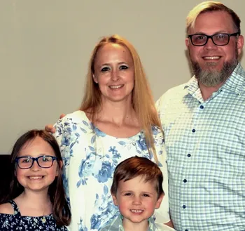 Chris, founder of Palmetteaux Services, with his family.